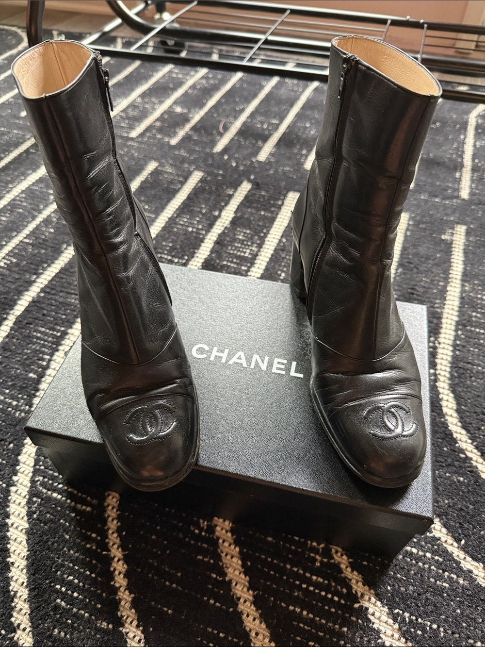 CHANEL Black Leather Ankle Booties with CC Toe Emboss